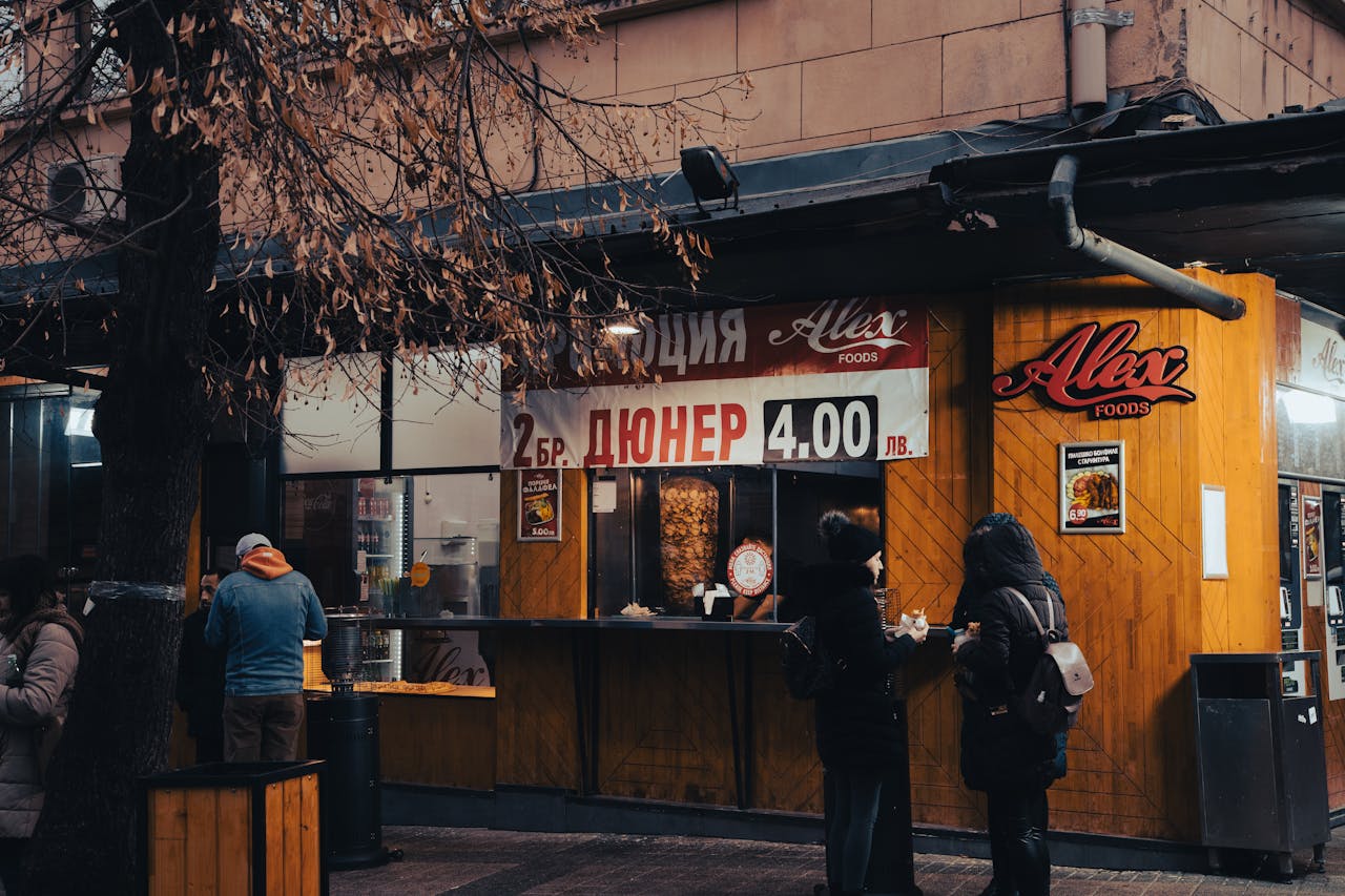 A cozy street food stand in Sofia serving döner kebabs on a winter day.